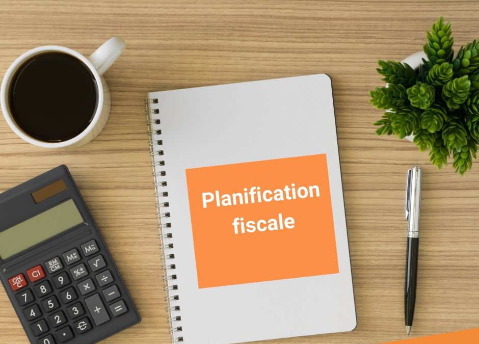 page d'un cahier sur lequel est écrit : planification fiscale